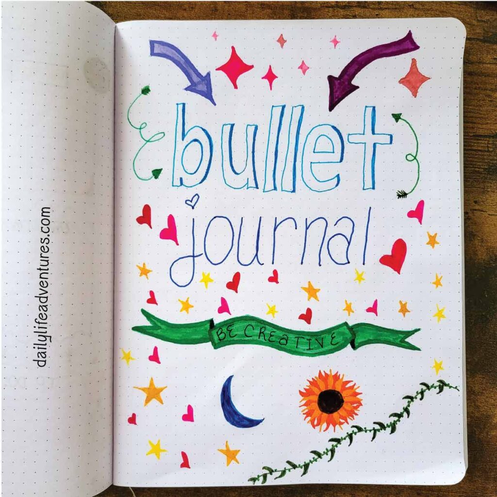 Bullet journal, be creative hand written on a page in a journal along with some stars, hearts, arrows and a few other small doodles.