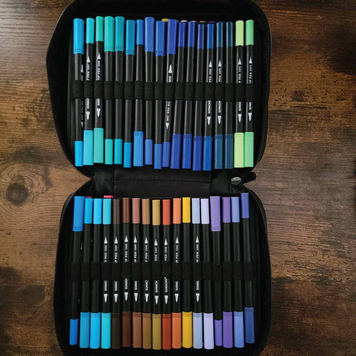 Set of Sunacme markers with the case open to show the markers in the carrying case they come with.