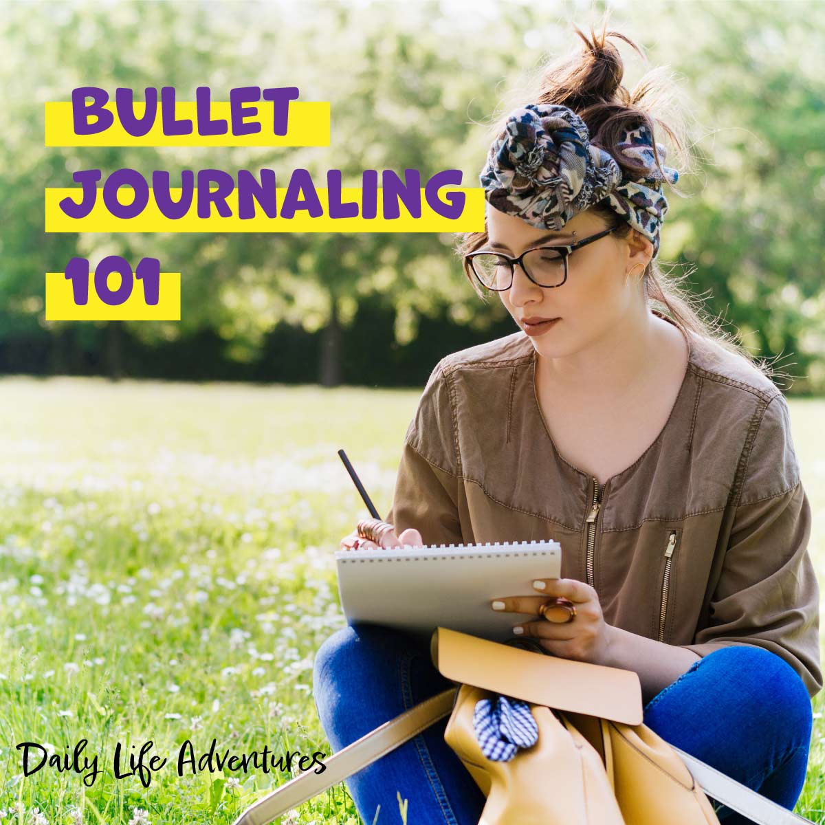 Bullet journaling 101. A girl sitting in a field writing in her notebook.