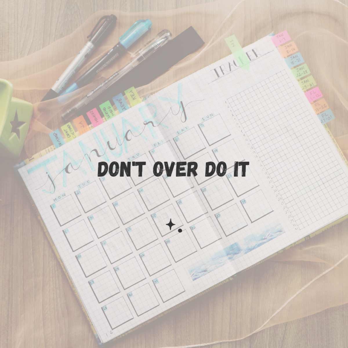 Don't over do it. Journal open to a hand drawn calendar.