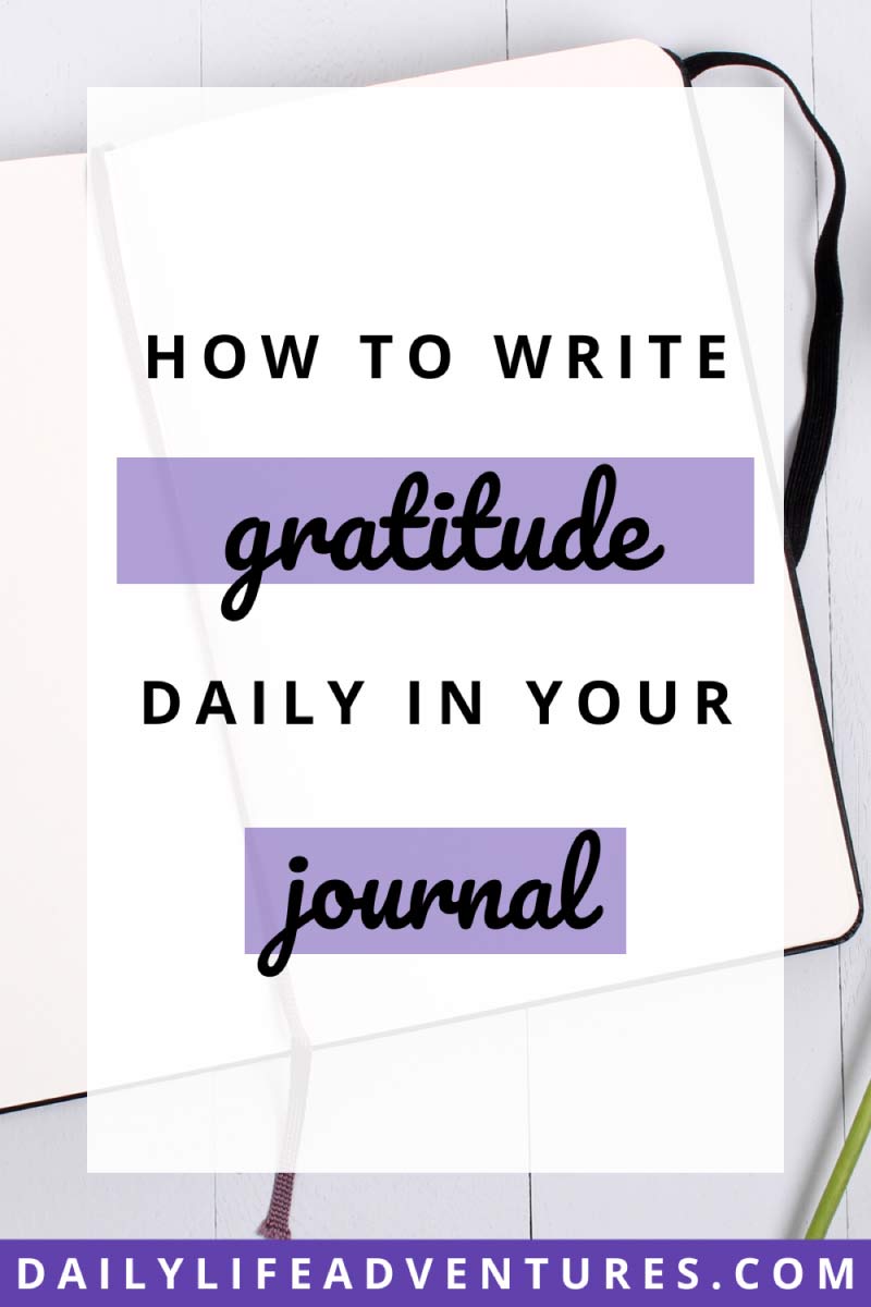 How to write gratitude daily in your journal Pinterest image. A journal open to a blank page ready to be written in.